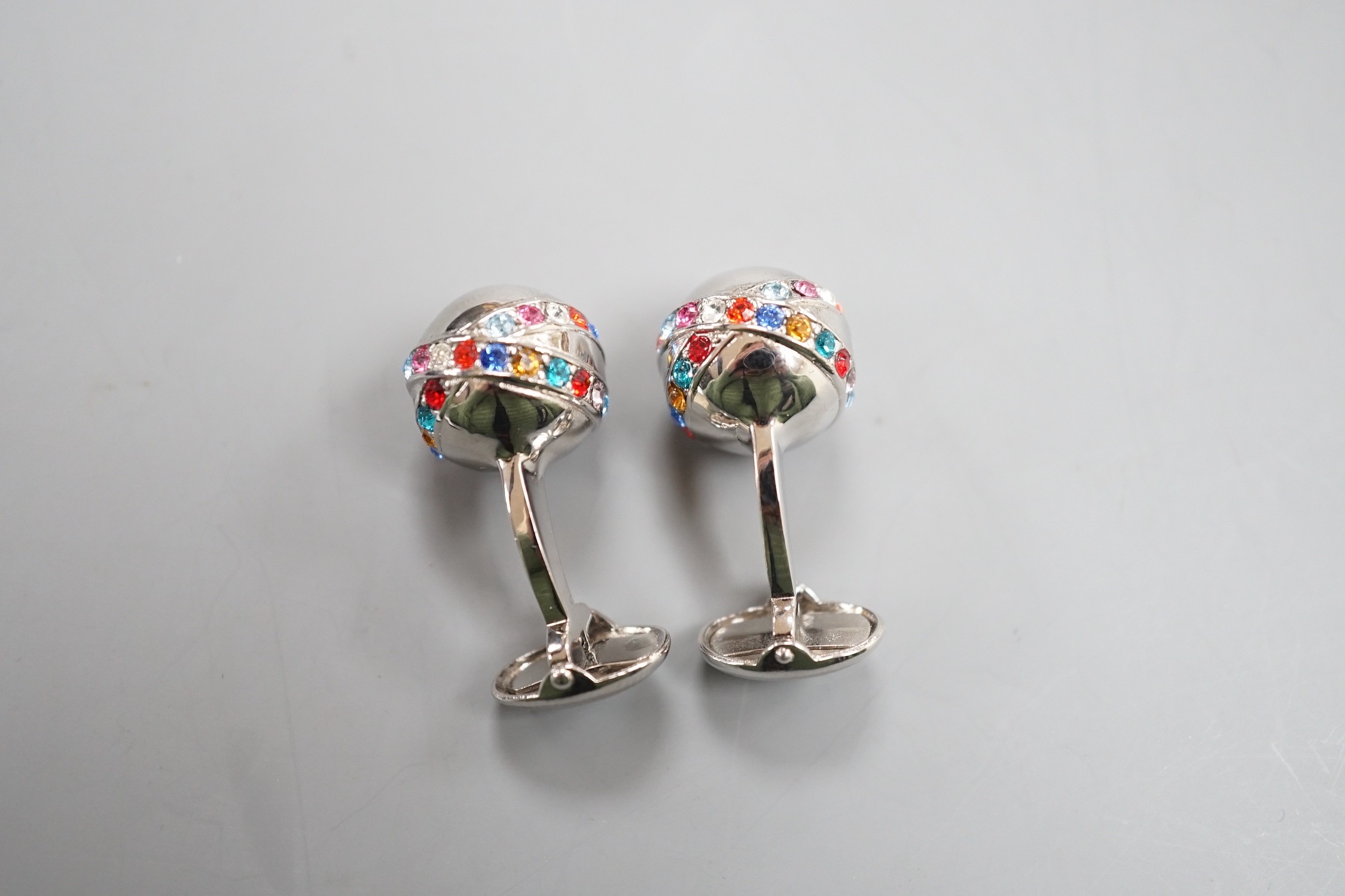 A modern pair of metal and coloured paste set cufflinks.